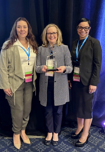 360-team-accepts-national-award